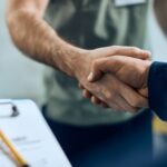 Two people shaking hands