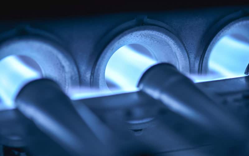 Blue flames from furnace burners